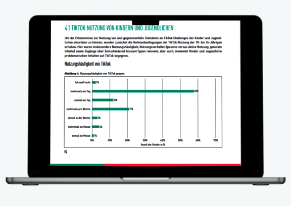 Ein aufgeklappter Laptopbildschirm, auf dem eine Grafik zu sehen ist.