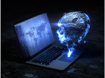 En Laptop, der blau leuchte und daneben ein menschlicher Kopf, ebenfalls blauch leuchtend.